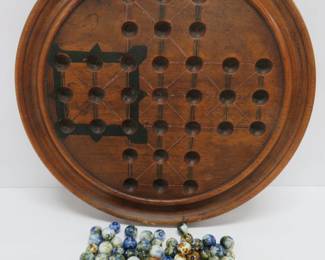 clay marbles and early marble board