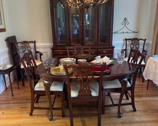 Dining table with insert 
2 captains chairs 
6 dining chairs 
Matching china cabinet 