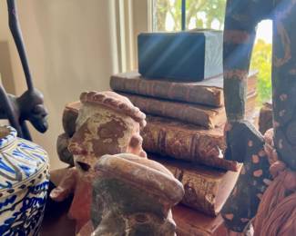 Many Santos and 18th century leather books