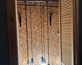 Unique industrial hanging light- great focal piece!