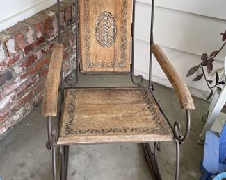 Wood Carved Rocking Chair in excellent condition.
