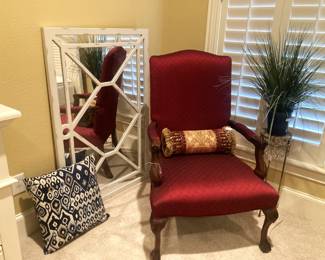 Large mirror; formal upholstered arm chair