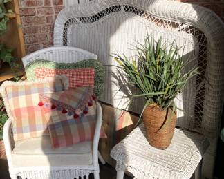 White wicker headboard, chair, and side table