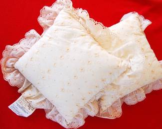 small eyelet pillows