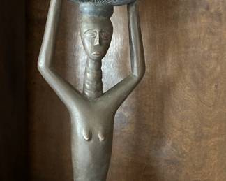 Woman Carrying Basket