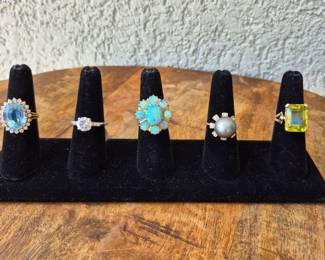 Gold rings with opal, pearl diamond, blue topaz and more