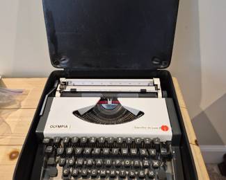 Vintage typewriter Olympia Traveller