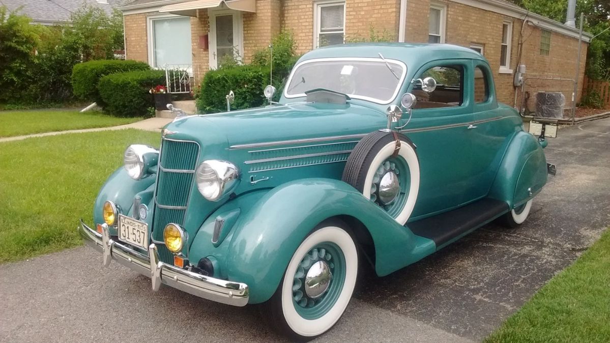 Experience classic automotive craftsmanship with this fully restored 1935 Business Coupe. This timeless vehicle has undergone a meticulous frame-off restoration, preserving its authenticity while incorporating select modern materials for enhanced durability and comfort.