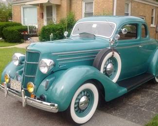 Experience classic automotive craftsmanship with this fully restored 1935 Business Coupe. This timeless vehicle has undergone a meticulous frame-off restoration, preserving its authenticity while incorporating select modern materials for enhanced durability and comfort.