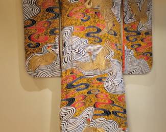 A Wedding Kimono with Gold Threaded Stork Detail, with Brass Rod.