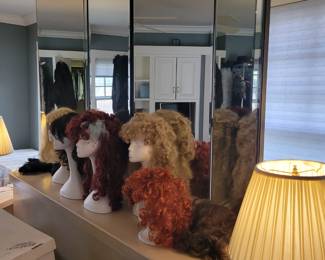 A five panel mirrored Headboard with matching Nightstands. 