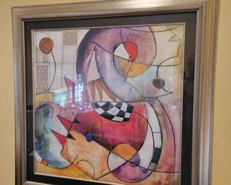 a large framed artwork by Eric Waugh.