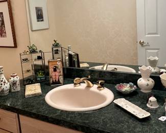 Great Powder Room Filled with Gorgeous Trinkets.