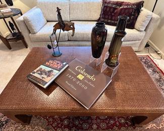 Stunning Harrison Van Horn (Pacific Design Center, Los Angeles, CA) Grass Cloth 47.5"W x 30"D x 17"H Coffee Table Shown with a Vintage Toy Swinging Pendulum Metal Cowboy on Horse, 19"H, a Collection of Weller Louweisa Hand-Painted Vases and Great Coffee Table Books.