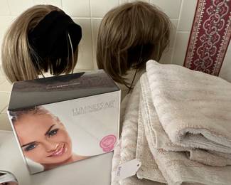 Two Adjustable Wigs (Stands Included) Shown with a Luminess Air Airbrush Makeup System.