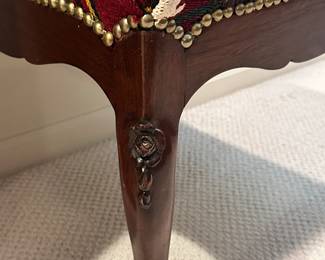 Details of the Intricate Carving on the Kilims Foot Stool.