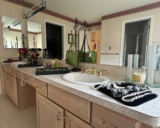 Overview of the Amazing Primary Suite with Still More Wonderful Jewlery and Hand Bags.