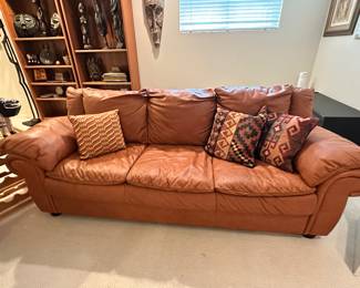 A Pair of Fabulous Italian Made 3-Cushion Leather Rust Colored Sofas in Great Condition! 80"W x 32.5"D x 34"H.