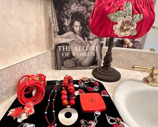 Beautiful Vintage Nettie Rosenstein Red Clutch with Detailed Embroidery and Sequins, a Fabulous Coffee Table Book by Francois Baudot, "The Allure of Women", a Chanel Compact and More Costume Jewelry.