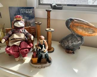 Whimsical Decor Including a Vintage Ceramic Glazed Pelican Artist Signed, Italian, Vintage Wooden Spools, Vintage Ceramic Cat Doll Seated in Wooden Armchair and a Porcelain D'Arte C-8625 Porcelain Figurine.
