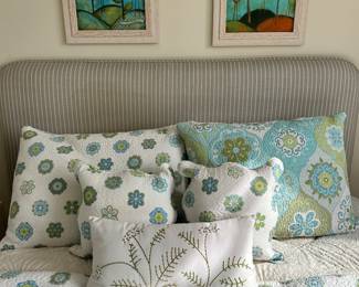 Custom Upholstered in Beige and White Stripes Full Sized Headboard with Matching Bed Skirt, a Pair of Signed Kandy Myny Prints and a Beautiful Full-Sized Reversible Quilt with Matching Pillow Shams and Decorative Throw Pillows by Artistic Accents.