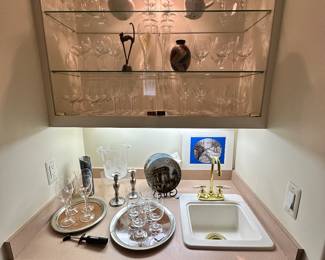 Compact Mini Bar in the Lower Level Full of Great Entertaining Essentials.