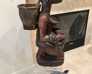 Side View of the Bakongo Maternity Figure Trival Wooden Art.