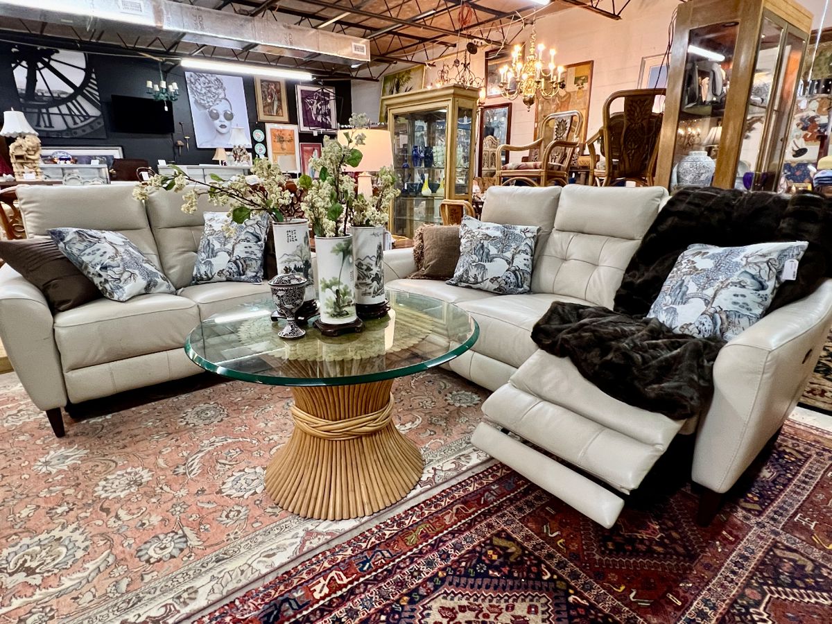 Leather Contemporary Sofa and Loveseat.  Foot rests and backs are electrical.  Very comfortable.  Sold separately.