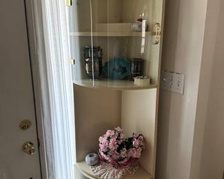 One of two MCM corner display cases 