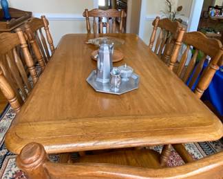 Matching table and chairs with additional leafs 