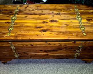 Classic cedar chest with decorative decals