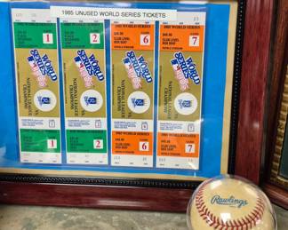 Much sports memorabilia. Framed unused 1985 World Series tickets and autographed baseballs