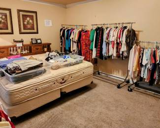 Master king bed and ladies clothes