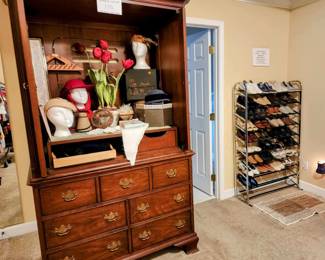 Grand armoire with vintage hats