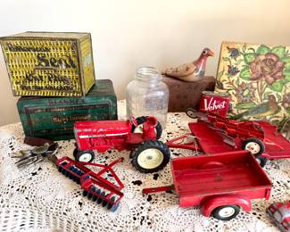 Antique tobacco tins, bottles, toy tractor and implements 
