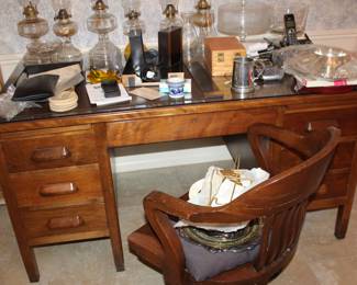 solid-wood office desk and bankers chair (comes apart for moving)