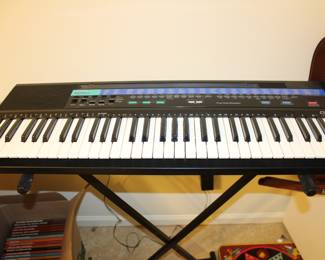 Casio electronic keyboard and stand
