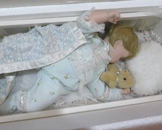Baby doll with cradle