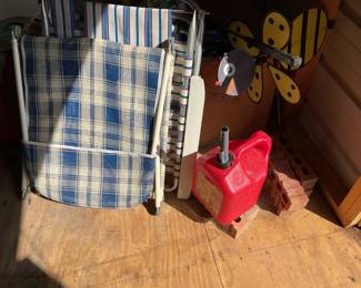 Yard chairs and gas cans