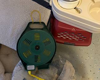 Miscellaneous: pet stuff and a hose reel