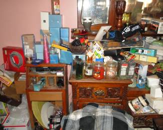 Still plenty of candles left and a lot of Avon product, boxes of Avon Jewelry and more