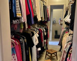 Closet full of designer clothing, purses, shoes,  and accessories 