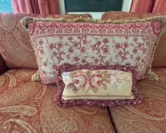 Many decorative pillows in home