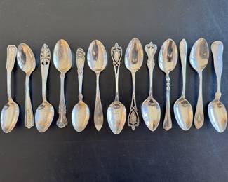Selection of vintage sterling souvenir spoons