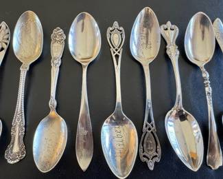 Selection of vintage sterling souvenir spoons