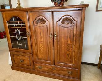 CLOSED VIEW OF ENTERTAINMENT CENTER (SMALL, VERY NICE, VERY HEAVY); COULD BE CONVERTED INTO A GREAT STORAGE CABINET