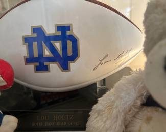 Sign notre dame football by Lou Holtz