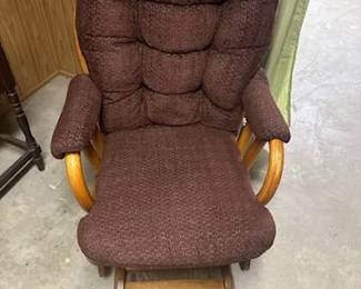 Cushioned Wood rocking chair.
