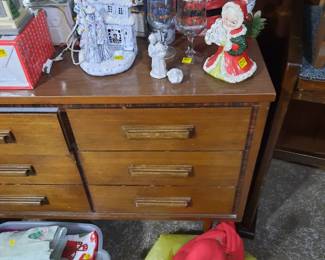 Christmas linens, table clothes, place mats multiple sets. Table runners. Hand towels. Vintage Ceramic  Mrs Clause. Lighted carollers outside church. Stuffed christmas mice inside basket.