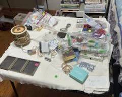 Jewelry. Tabel will be full of Jewelry. Sewing box with contents. Craft books. Sewing basket with homemade pin cushion. Jewelry box. Picture frames.